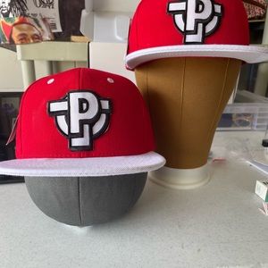 Red logo hats positive talk only